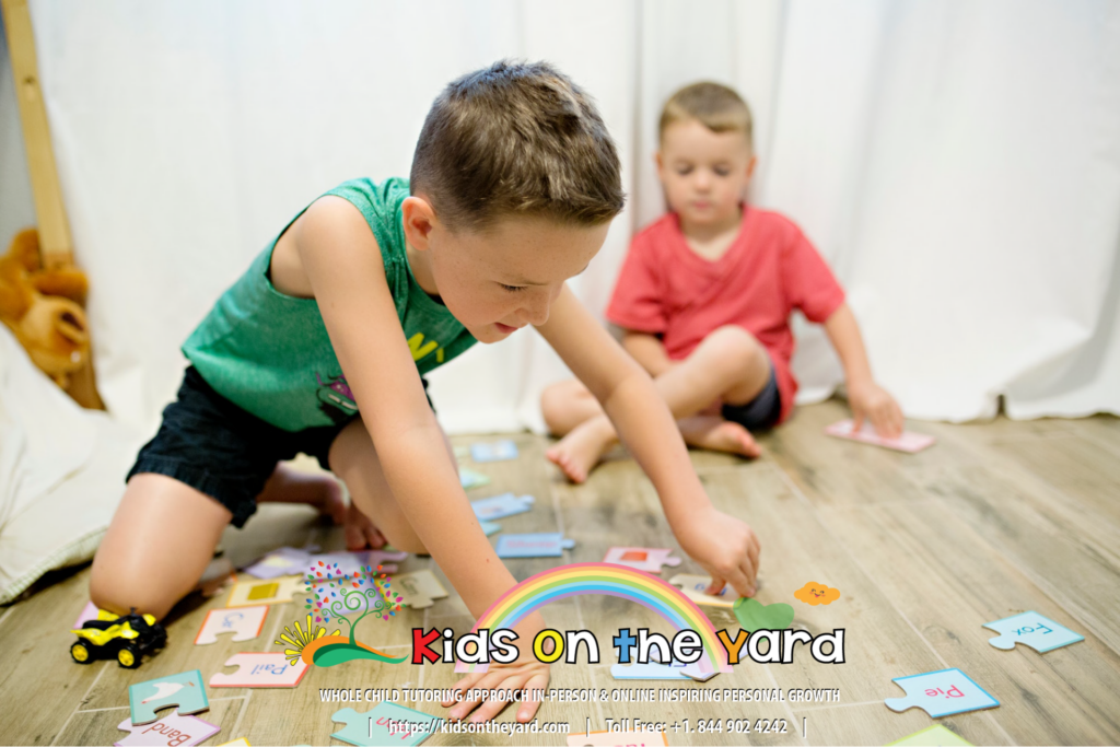 Boy spelling words using a puzzle game