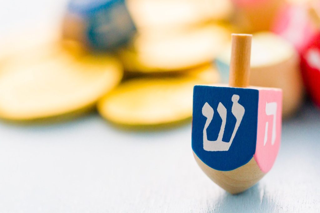 Dreidel games bring joy and laughter, creating cherished memories during Hanukkah