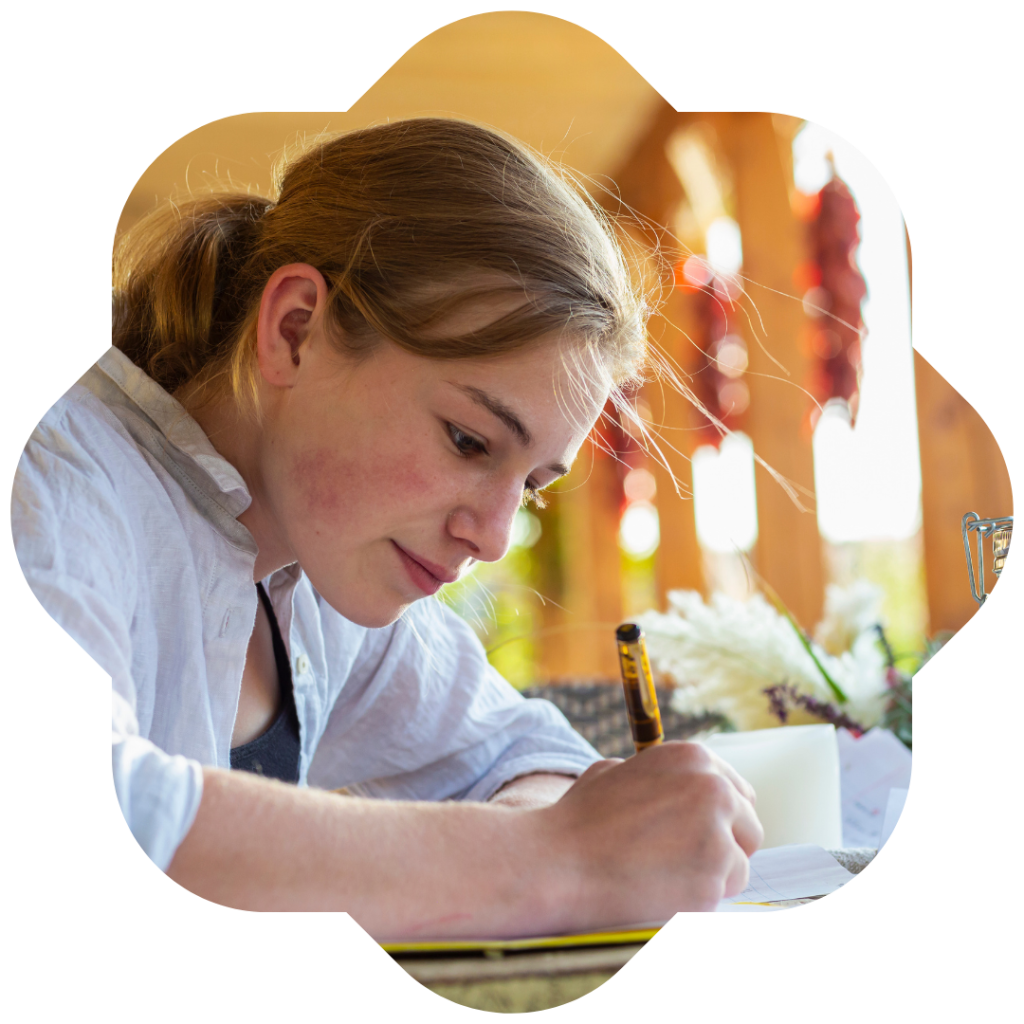 Teen girl cramming for State Testing.